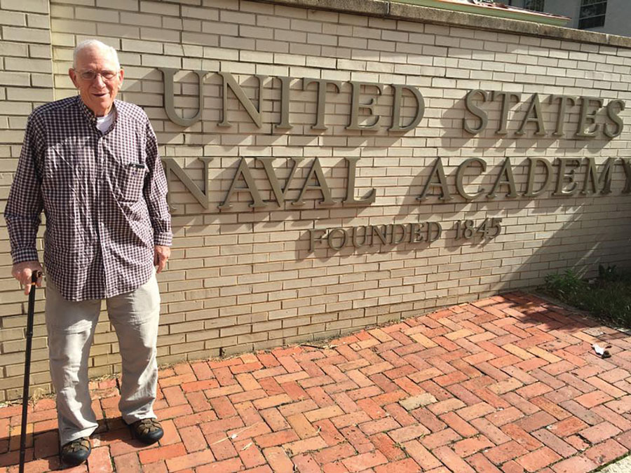 Photo taken 2016: Chuck standing outside his 'home' of 60 years ago.